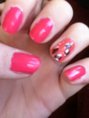 I love doing bright, fun nails! And adding a cheetah accent just makes the look even more fun.