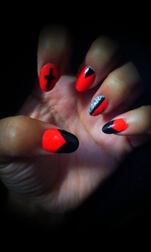 Coral & black nails,with a touch of silver glitter.