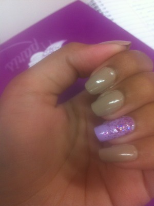 Nude with pastel purple and glitter on ring finger :)