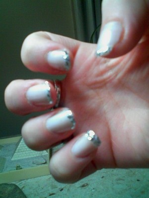 Glittery french nails! I used Essie nail polish in Marshmellow for the base and Set in Stones for the glitter tip. 