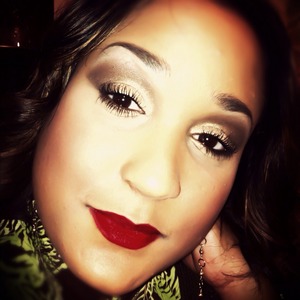 Rocking Ruby Woo by MAC!!! Love a gold eye and red lip