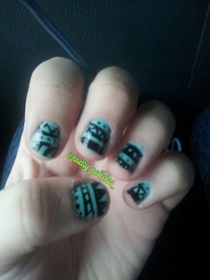 Tribal nailart in bright teal and black.

*base color: China Glaze- "For Audrey"
*detail color: Sally Hansen "Black Out"

Find me on instagram!  @ pretty_polishes_