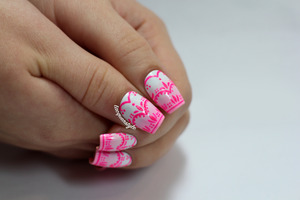 More info + tutorial here:
http://www.lacquerstyle.com/2013/11/pink-lace-nails-for-breast-cancer.html