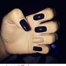 Black gold nails