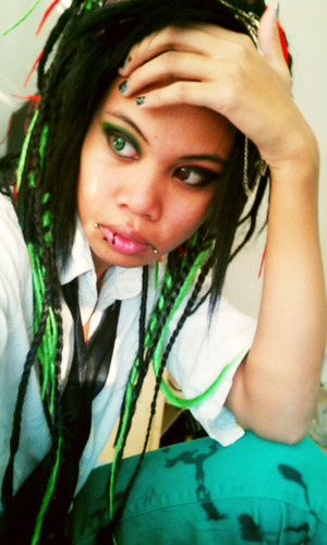 I'm pretty sure I did this around Christmas time last year. Red/Green/Black synthetic dreads.. and some braids thrown in there. All made with Kanekalon hair. 