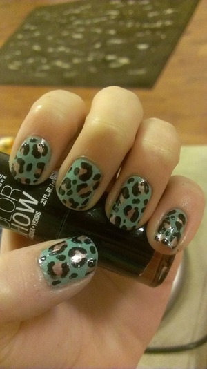 my nails for today, just did them myself! the teal is OPI Mermaid Tears, the bronze color is by Rimmel in 308 Powerhouse, and the black is Maybelline Color Show in Onyx Rush. 