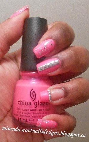 I used China Glaze Pink Voltage ( Neon), Orly Holy Holo and Wet n Wild Kaleidoscope. I also used Born Pretty Store's Studs for the two middle fingers.