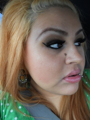 Brown&Gold Thick lashes and winged liner.. I believe its an inglot blush and a dark nude lip