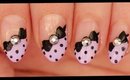 Black Dots & Bows on Pastel Purple nail art