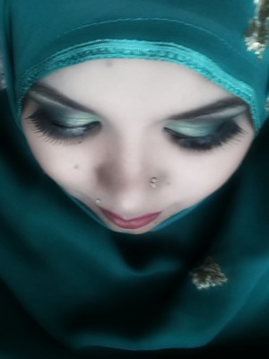 emerald green look I have given with black and white eye shadow 