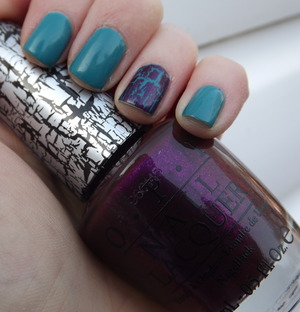 A turquosie green and deep purple with a hint of sparkle shatter