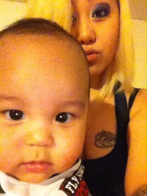 My short hair without my extensions on..and yes that cutey in the picture is my son :)