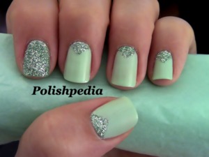 Don't you just love these nails.  I do!  I am so happy with how they turned out.

Video Tutorial For Them: http://www.polishpedia.com/triangle-nails-with-glitter.html