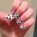 Rainbow cheetah nails