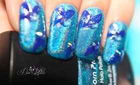 Simple half flower nail art featuring Born Pretty Holo polish (blue)