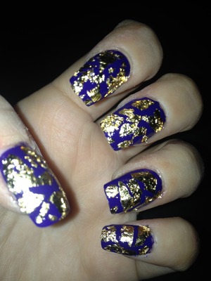 Used Barry M in Indigo and a Gold leaf sheet which I broke into pieces and placed with tweezers. 