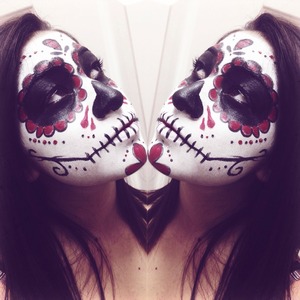 Dia de Los muertos theme Halloween makeup on my lil sister sugar skull💀🌹💀