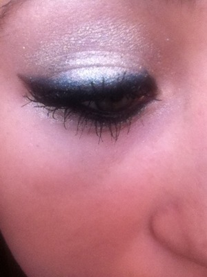 Sparkly white with black and blue darker eyeshadow as the liner
