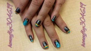 black and turquoise design with gold studs