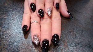 almond shaped black nails with glitter by SauceC Nailz