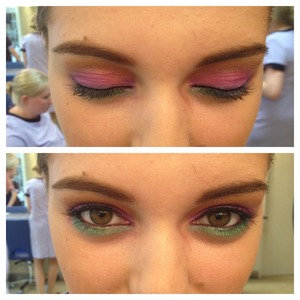 Pink eyeshadow with gold above the eye socket and green underneath 