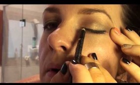 applying eyeliner