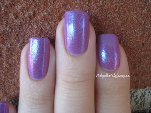Cult Nails Charlatan on top of Essie Play Date.  So beautiful!