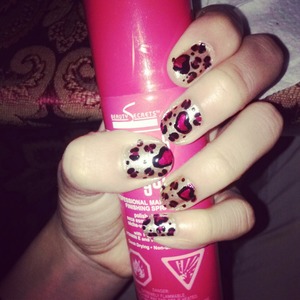 Cheetah print nails with a heart c: perfect for valentines day