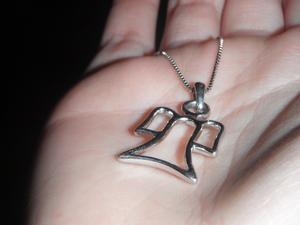 My pendant that I wear in honour of my grandma <3 I thought this picture was cool and wanted to share it.