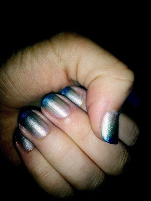 Blue Gradation using Ice brand nail polish and a makeup sponge. (: