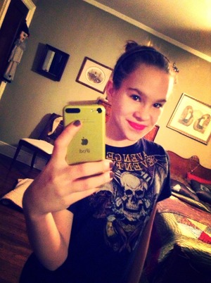 Nice red lip:) adding that pop of color to black combat boots, black leggings, this shirt and and bun:)