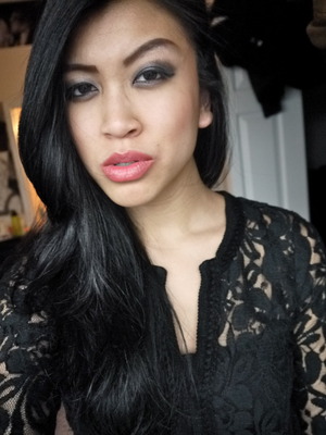 Here is a more "natural" look. Emphasis is on a strong brow and  smoky eye. Rose lip liner and color as well as rosy cheek bones help complete the look, with a curtain of pure black hair and lace. 