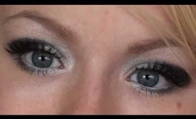 Glamorous silver look featuring false lashes with diamonds