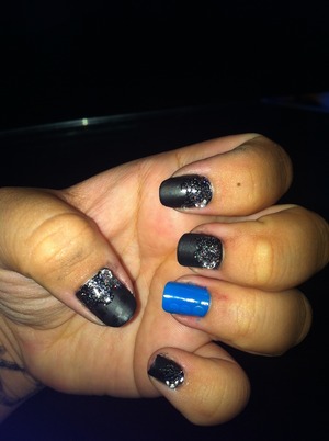 Accent nail: blue with three matte top coat dots on the side.
Four nails: black base, matte top coat, glitter on the top half, & a small crescent moon gem in the corner.