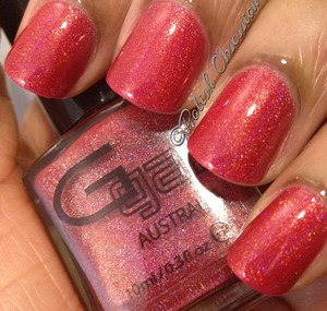 http://www.polish-obsession.com/2013/04/glitter-gal-not-another-red.html
