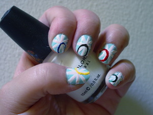 pastel british flag with french tips in Olympic colors
complete salon manicure - barracuda (blue)
sinful colors - snow me white
sinful colors - easy going (pink)
sinful colors -  ruby ruby (red)
sinful colors -  midnight blue 
kiss fine art pen - black 
Ulta  - envy (green) 
sally hansen insta dry - Lightening