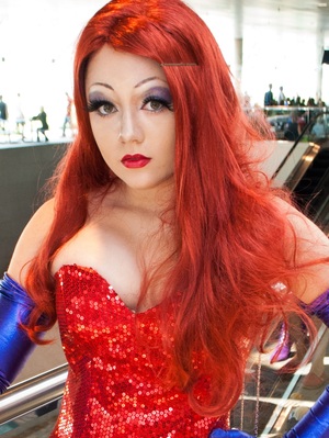 The makeup I did for my Otakon 2012 cosplay of Jessica Rabbit. Lots of contouring was used! I drew my brows up about an inch above my natural browbone. (my eyebrows are a bit faded in this picture, but its the best one I've found!)
photo credit: http://www.flickr.com/photos/undyingmagic/7684347704/in/faves-35482618@N05/