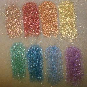 NYX Pearl Pigments in (L to R) Mink Pearl, Penny Pearl, Orange Pearl, Yellow Gold Pearl, Turquoise Pearl, Ocean Blue Pearl, Space Pearl, and Purple Pearl