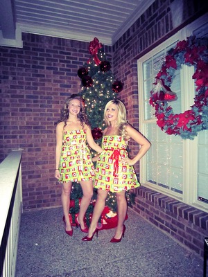 we made wrapping paper dresses:)