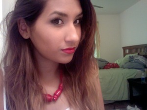 Red lips, gold and navy blue eyes. :)