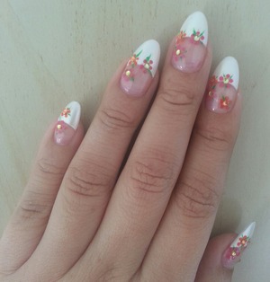 French tip nails with spring flower accents