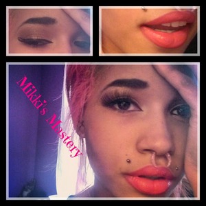 Sexy Red Lip with Gold and brown shadow and fluttering lashes. 
Pictorial on www.facebook.com/mikkismastery