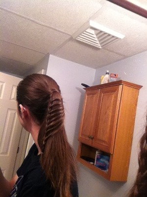 The only tool I used was a topsy tail to get the wrapped look at the base of my ponytail. This, of course, is optional. 