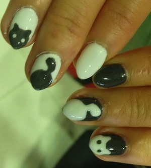 Kitty cat nails. I was inspired by a leotard I just bought from lazy oaf. :)