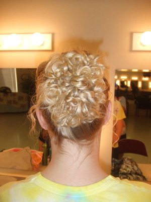 Bridesmaid hair I did for my friend's wedding.
Curly updo.