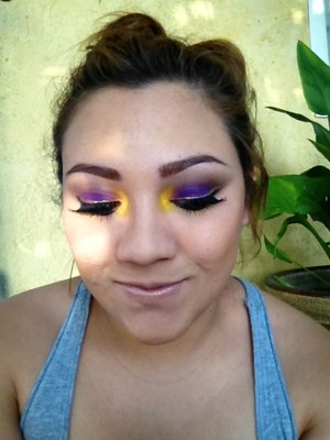 bright purple lid with gold eyeliner