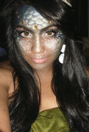 
iv alrdy done a mermaid look before.. but wasnt that satisfied.. Disney movie's Atlantis inspired me to do the dark skin tone =D also i thought it would make shimer and rhinestones stand out more.