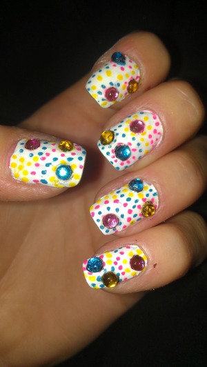Almost good enough to eat! Multicolored rhinestones on a white background. 
