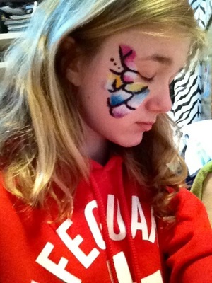 Inspired by the wings of a butterfly :) My medium was face paint crayons.