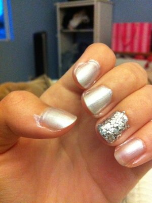 Disco Ball Nails- Fun silver nails with chunky silver glitter on the accent nail giving a disco ball effect